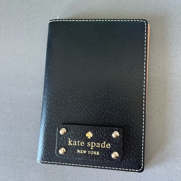 kate spade Handbags - EUC Kate Spade black Wellesley travel Passport Holder wallet